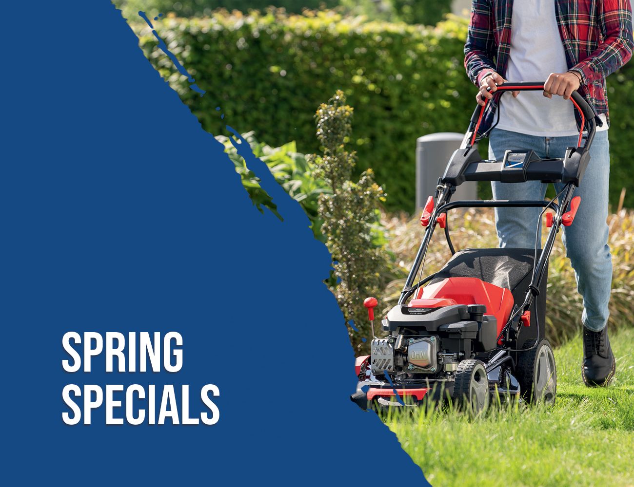 Person operating a Scheppach lawnmower in springtime