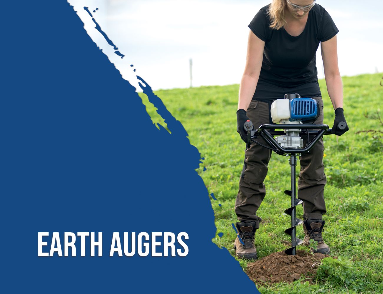 A person using a Scheppach earth auger on a grassy field. The auger features a motor and a spiral drilling tip.