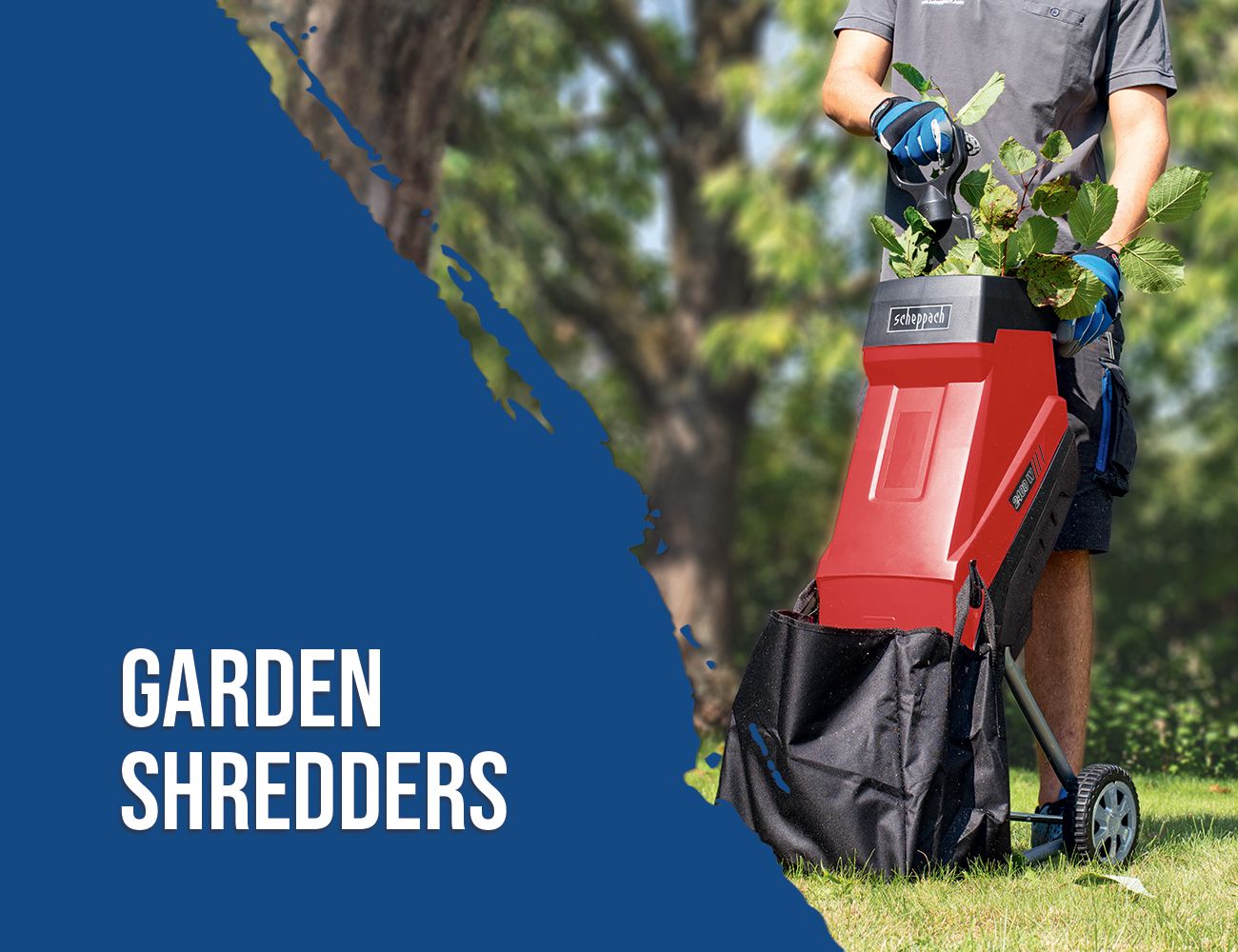 A Scheppach garden shredder in use. A person is feeding branches into the shredder.