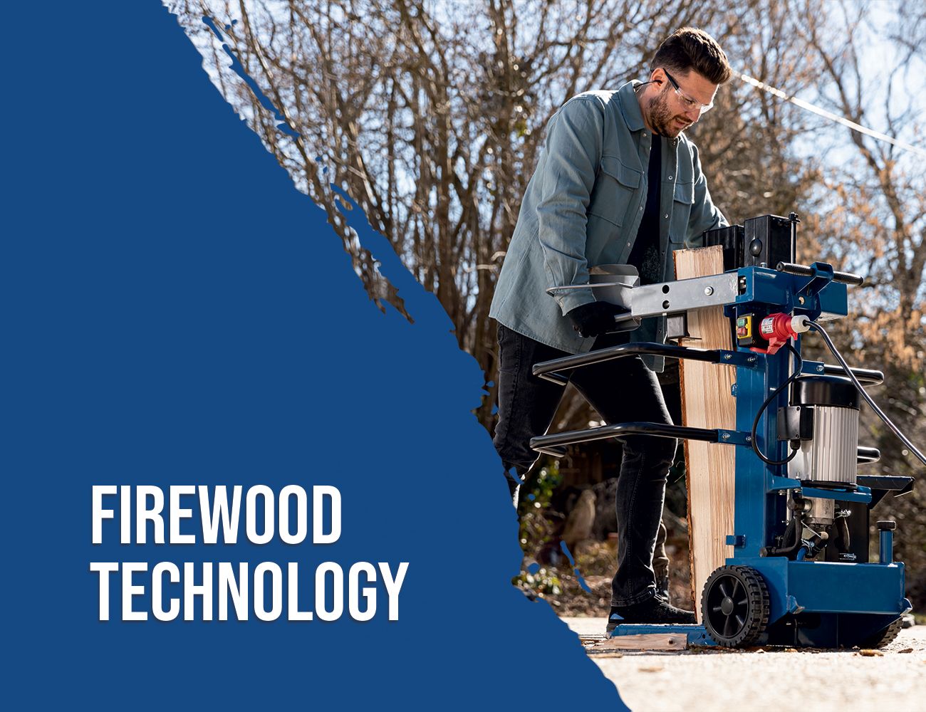 A man operates a Scheppach firewood splitter machine outdoors. The machine is placed on a wooden block and is cutting a piece of wood. Trees are visible in the background.