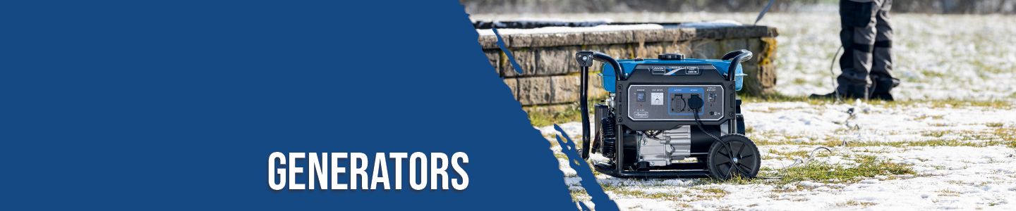 A Scheppach generator on a grassy ground with some snow. A person is standing next to it.