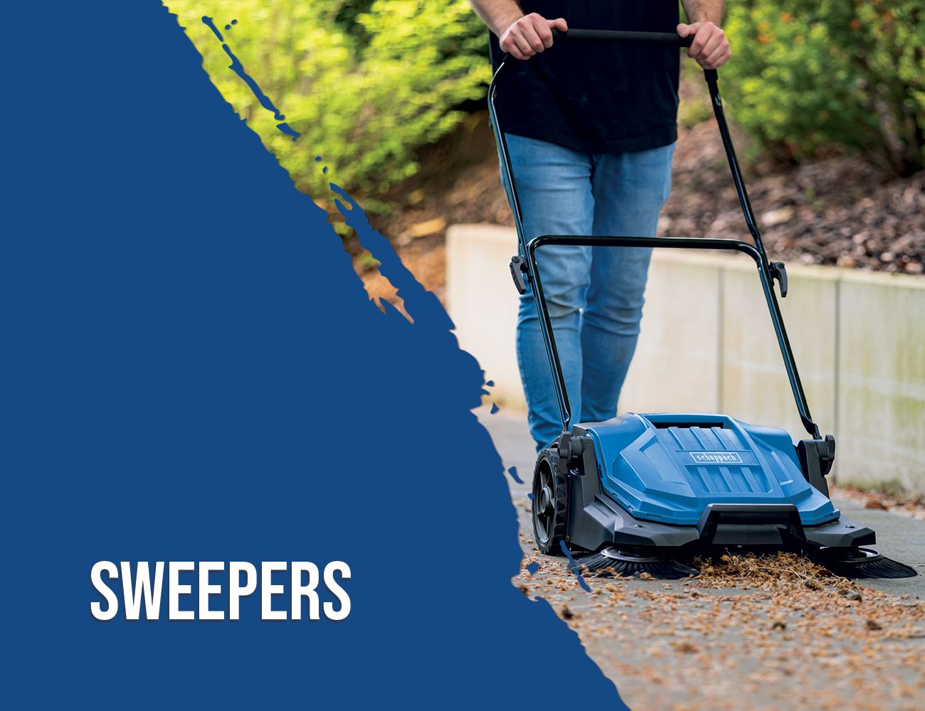 A Scheppach sweeper being used by a person on a path with leaves.