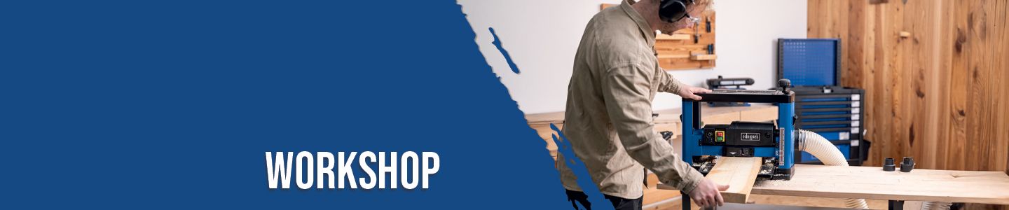 A man is working in a workshop using a Scheppach edge sander on a wooden board. Tools and a workbench are visible in the background.