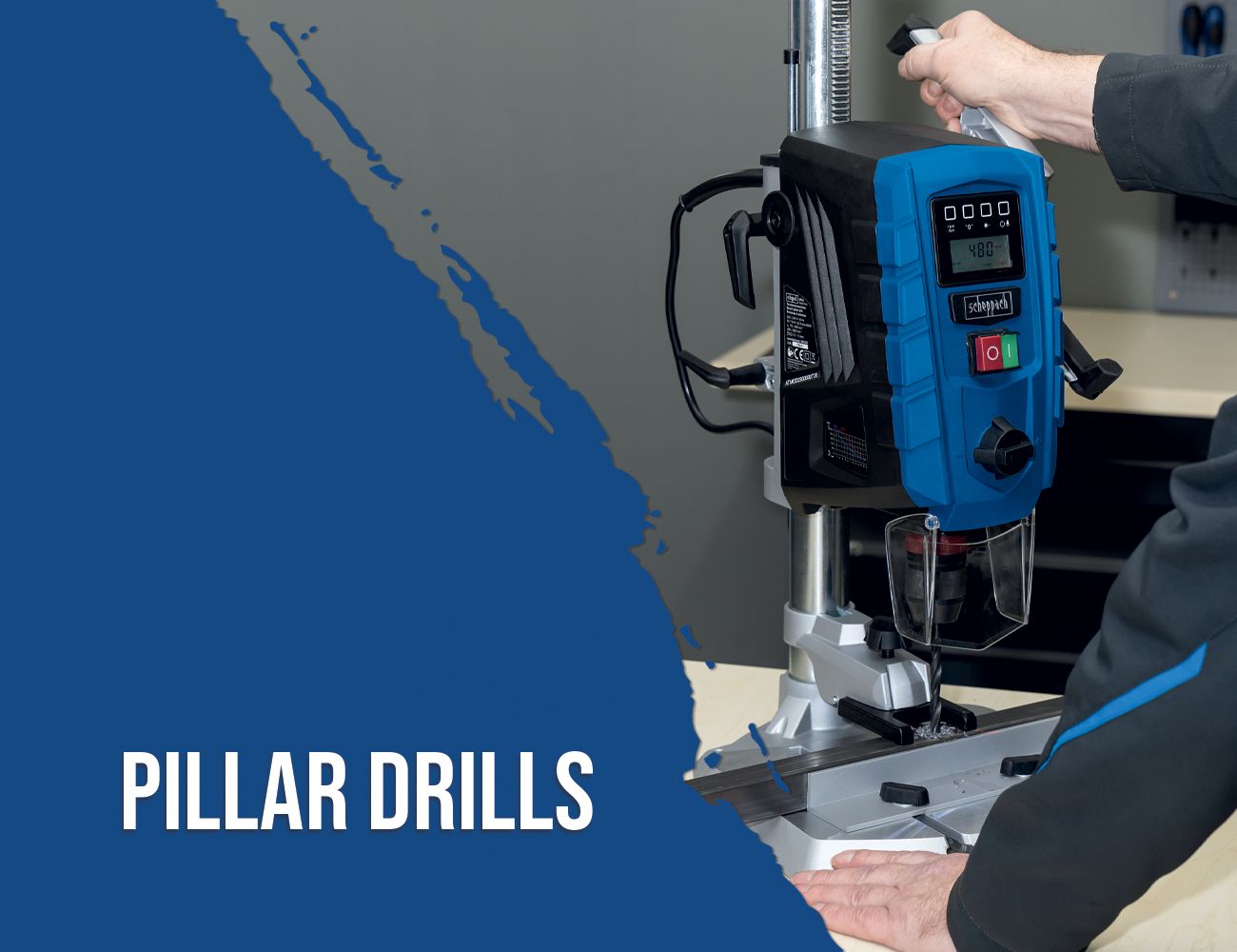 A Scheppach pillar drill in use. A worker is operating the machine, which features a digital display.