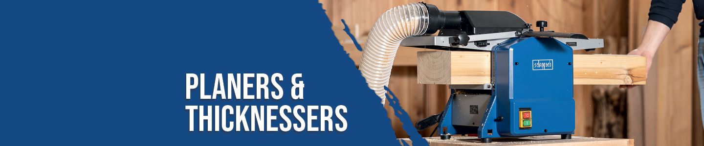 A Scheppach planer with wood, used for woodworking. A man is holding a wooden board into the machine.