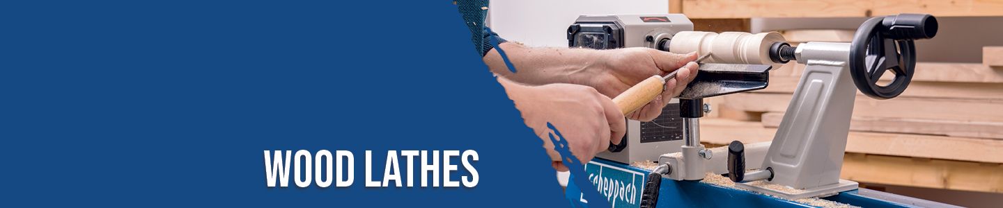 A Scheppach wood lathe in use. A workpiece is being shaped as wood shavings are produced.