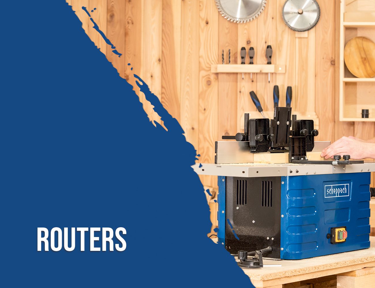 A Scheppach router in a workshop with various tools in the background.