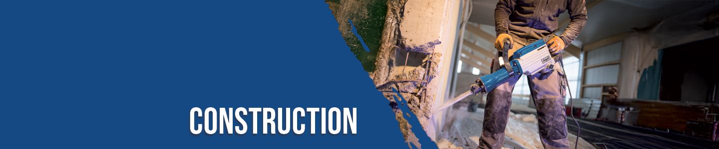 A worker uses a Scheppach tool in a construction setting. A map of the United Kingdom is visible in the background. The image category is 'Construction'.