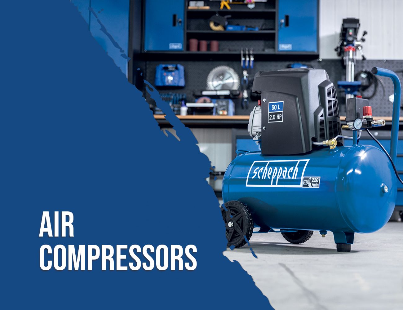 A Scheppach air compressor in a workshop, surrounded by tools and equipment. The compressor has a 50-litre capacity and a power of 2.0 HP.