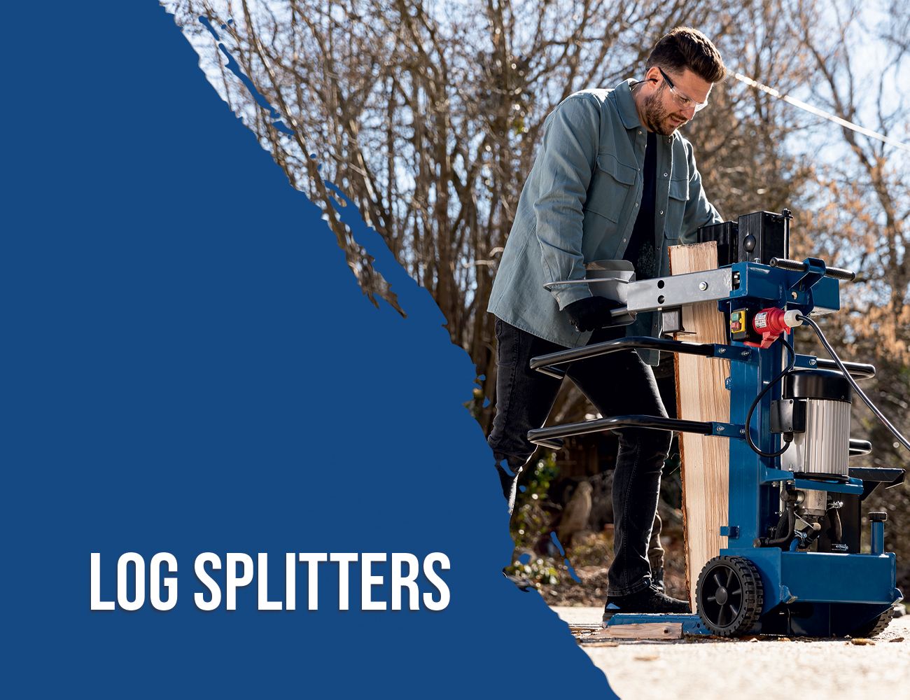 A man operates a log splitter machine by Scheppach outdoors. The machine is placed on a wooden block and is used for splitting pieces of wood.