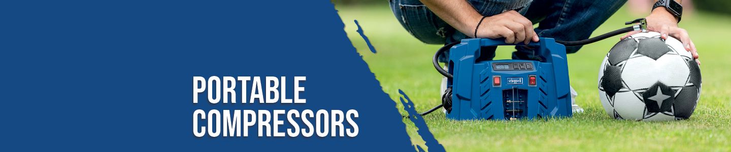 A portable compressor by Scheppach is used on a football field to inflate a football. The compressor is blue and has a hose connected to the football. A person is holding the compressor and inflating the football.