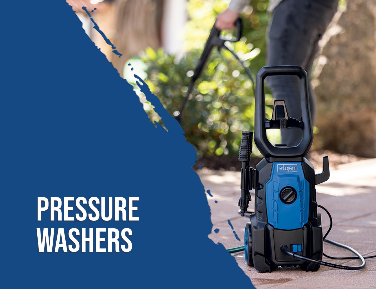 Scheppach pressure washer in use. A man is operating the machine on a pavement.