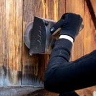 Scheppach slat brush in use on wooden surface