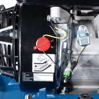 Close-up view of a Scheppach tool showing engine and control components