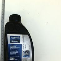 Scheppach compressor oil 5W-40 bottle with label and measurement scale