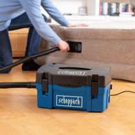 Scheppach HD2P suction unit with plastic housing, including drill and suction-blow nozzle in use