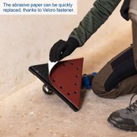 Wall and ceiling sander with quick-change sanding head featuring Velcro attachment for easy replacement