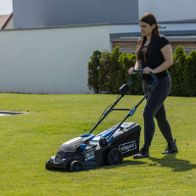 Scheppach cordless lawnmower BC-MP380-X with basket, actively mowing grass