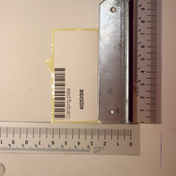 Clamping plate by Scheppach, item number 40253006, with barcode and label, photographed from the side.