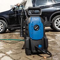 High-pressure cleaner with hose attachment for Scheppach HPC1400 model, being used near a vehicle