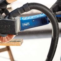 Scheppach Nylon wire wheel in use with a machine on wood