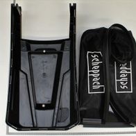 Catch basket set by Scheppach, including black net and holder, with screws and nuts. The parts are laid out on a light background.