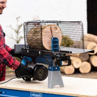 Scheppach HL460 horizontal log splitter with wood piece in the splitting compartment, electric-powered, DIY model