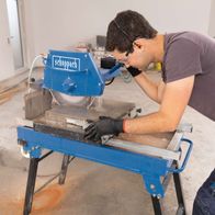 Scheppach stone cutter with worktable, attachment, and safety gear