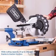 Scheppach sliding mitre saw showing 340 mm cutting capacity with traction feature, cutting board and handle