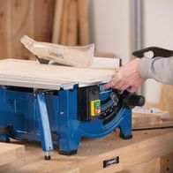 Table saw with adjustable tilt for accurate cuts, featuring a tilt mechanism and work surface