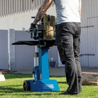 Scheppach HL810 hydraulic log splitter with log splitting attachment, shown in use with a piece of wood