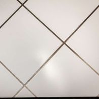 White Scheppach tool with diagonal lines against a plain white background