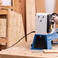 Scheppach lathe machine with workpiece clamp for 350 mm diameter, in use