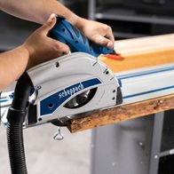 Scheppach plunge saw with guide rail and 24-inch blade in use