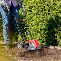 Electric tiller with 450mm width and 220mm depth for gardening, featuring soft-start mechanism