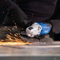 Scheppach cordless angle grinder with grinding action, sparks visible during operation