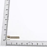 M6x20 cheese head screw shown alongside a measuring scale