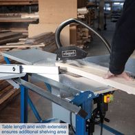 Table saw with extendable table for extra workspace and guide system for accurate cuts