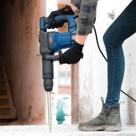 Scheppach demolition hammer with SDS-Max attachment, shown operating with drill bit