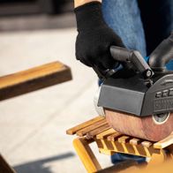 Scheppach synthetic fiber brush with keyway holder in use, mounted on wooden base