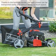 Foldable Scheppach lawnmower with compact design for easy transport and storage featuring a foldable handle