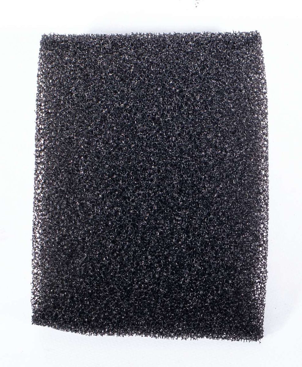A piece of black wire mesh, possibly a filter or sieve.