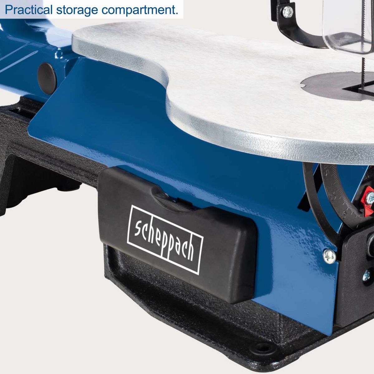 Practical storage compartment for tools on a scroll saw