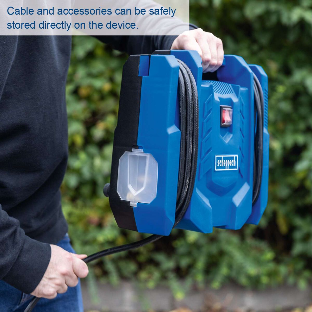 Portable air compressor with built-in cable holder for easy mobility, featuring accessory storage.