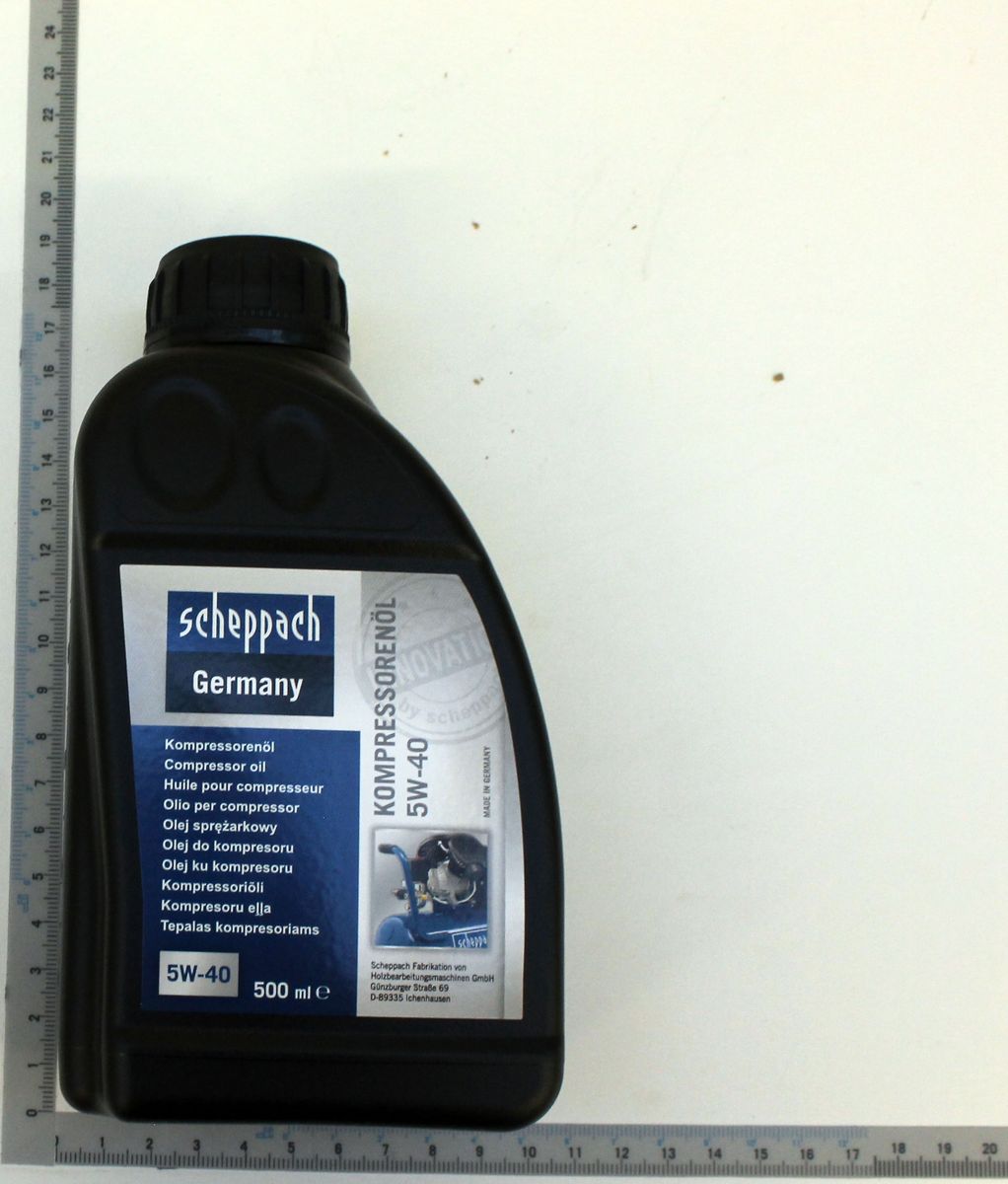 Scheppach compressor oil 5W-40 bottle with label and measurement scale