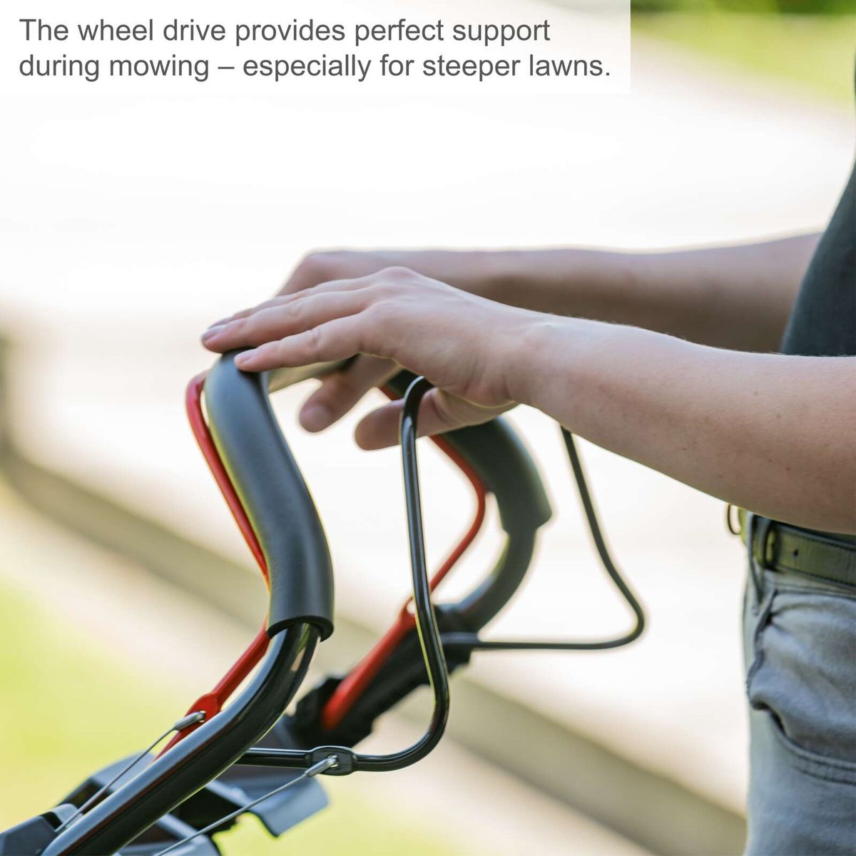 Wheel drive feature for Scheppach lawnmower MS173-51E, aiding in mowing on inclines