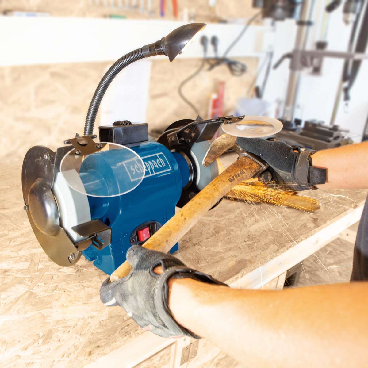 Scheppach dual disc grinder with disc removal clamp and lamp holder for grinding wheel