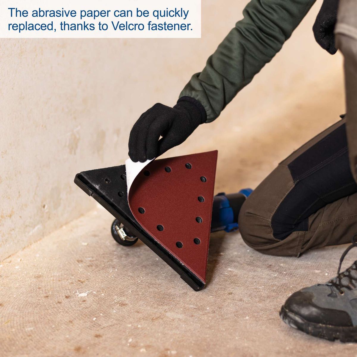 Wall and ceiling sander with quick-change sanding head featuring Velcro attachment for easy replacement