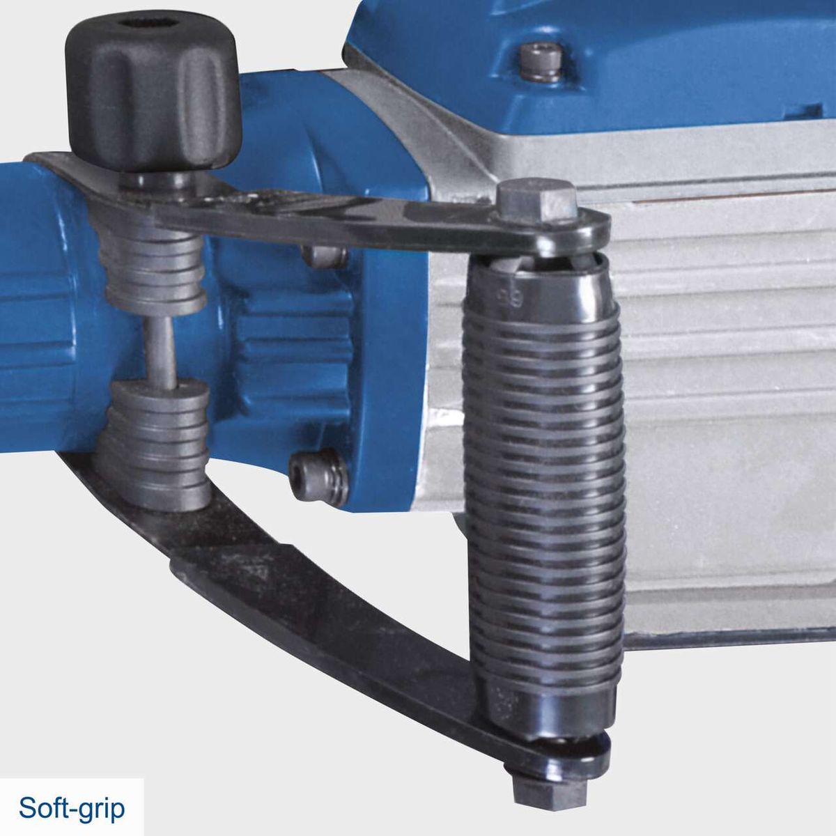 Anti-vibration soft grip for demolition hammer with integrated shock absorption