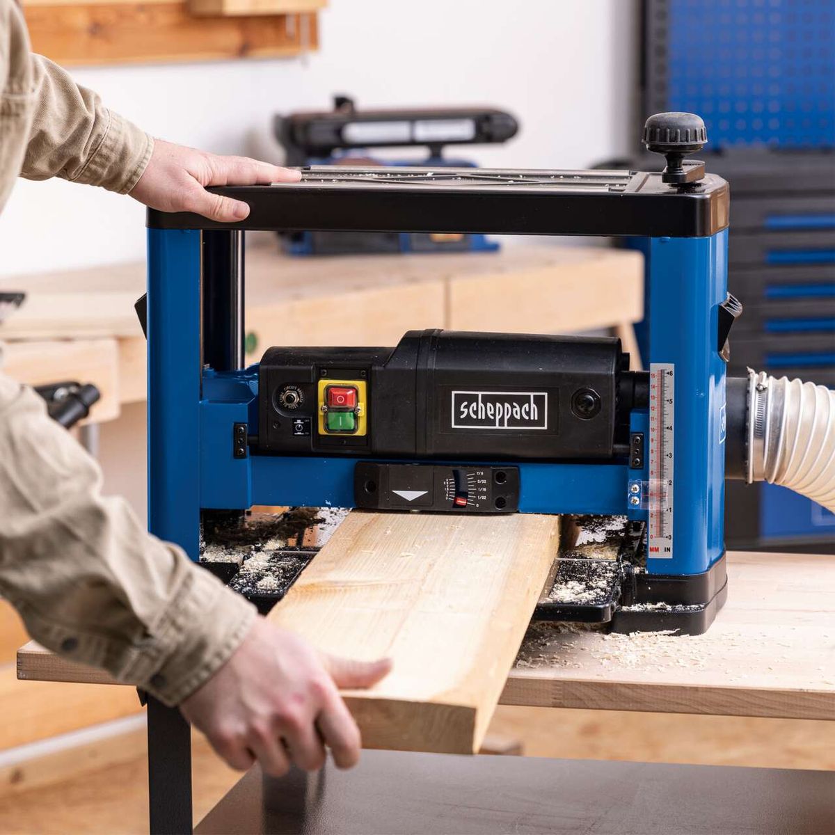 Scheppach thickness planer with control knobs and speed indicator for accurate settings